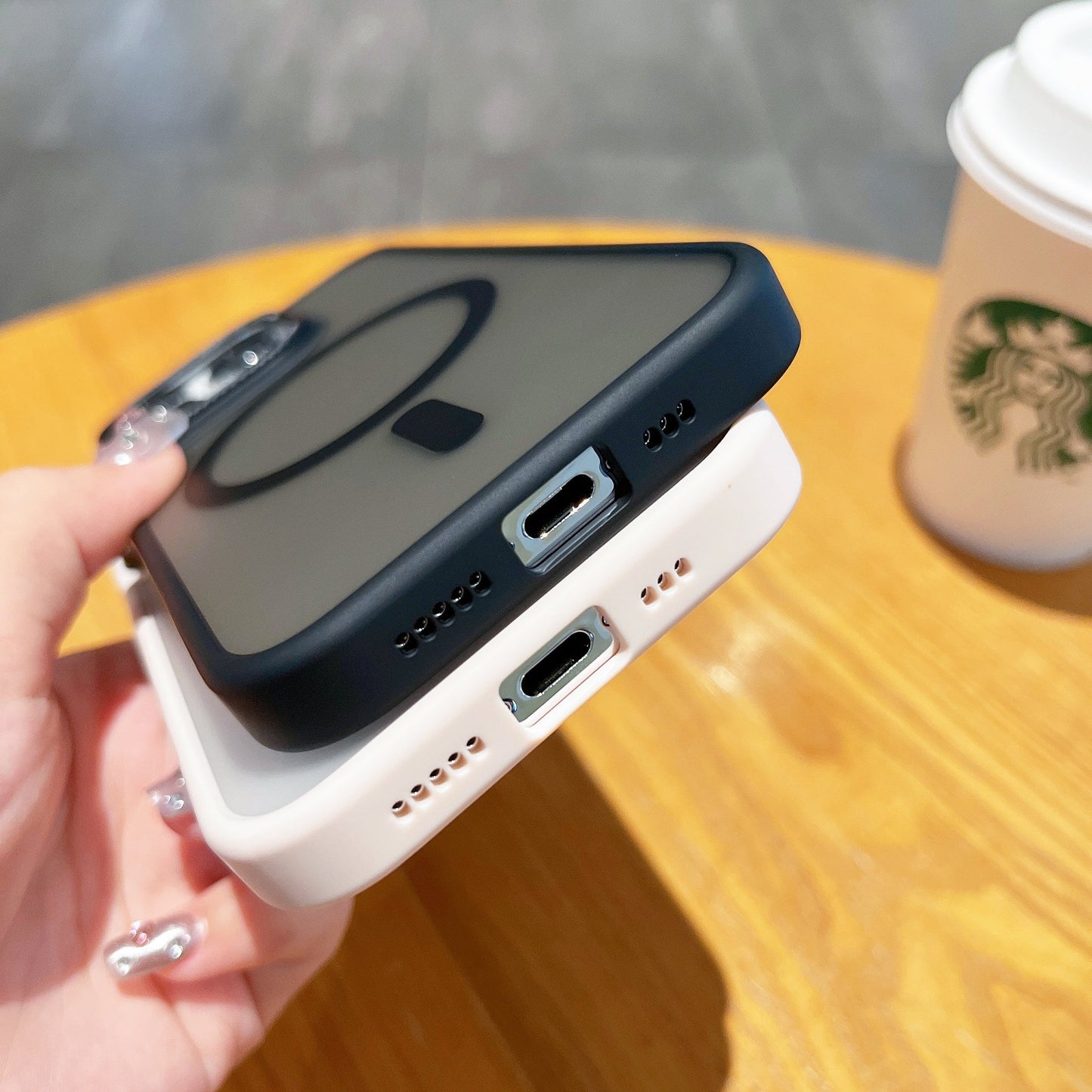 Frosted metal lens magnetic phone case with secure fit, designed for sleek protection and style.